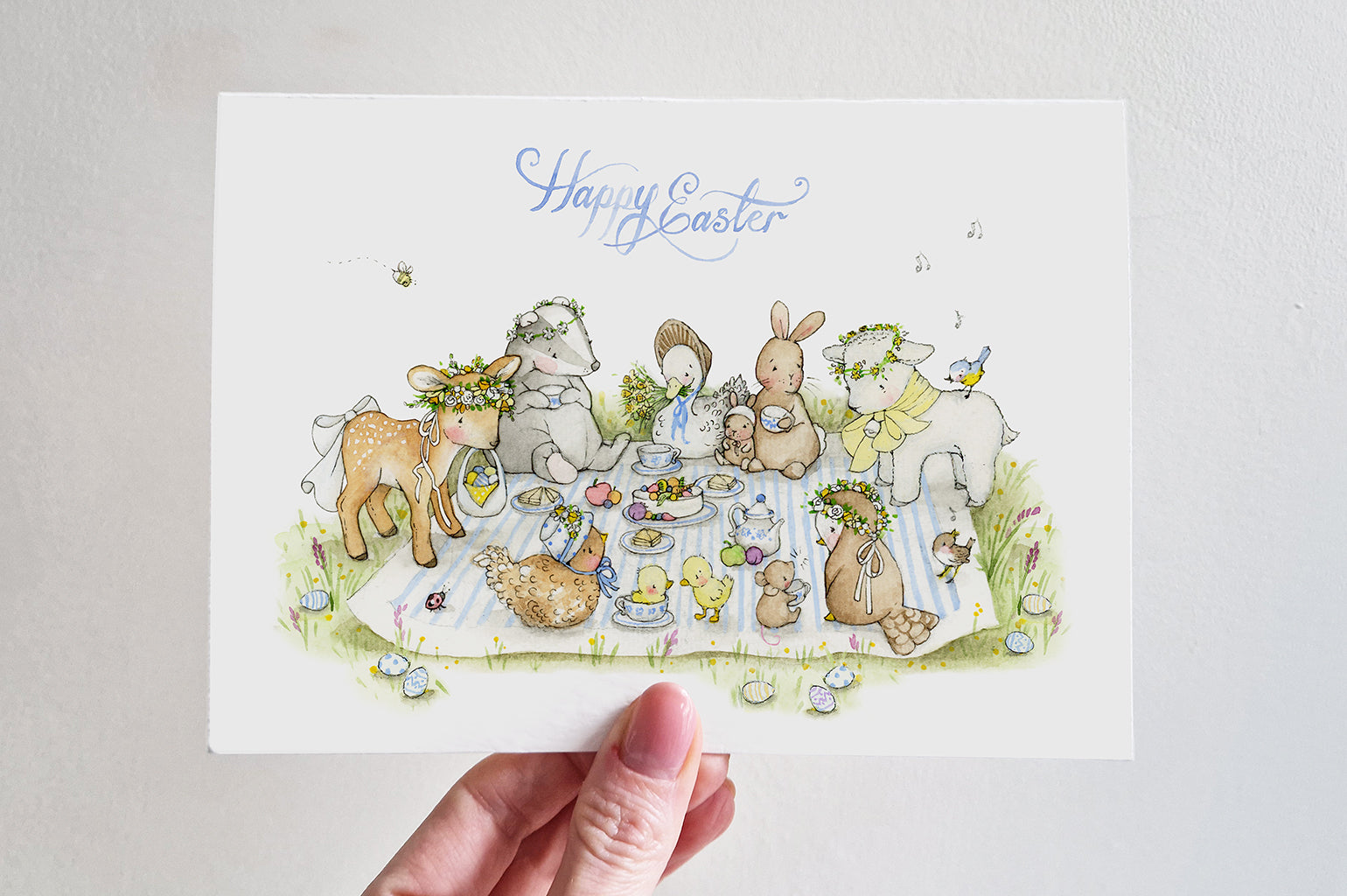 Illustrated happy easter picnic greetings card